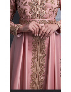 Caftans A woman wearing the art of Fatma Ayadi Ben Mahmoud will